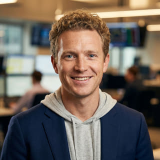 Profile photo showing Ryan Brooks, listed as Lead Trading Analyst at Frank Pledgentance